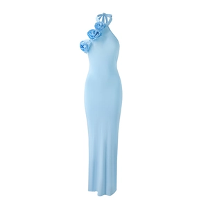 Detail of light blue halter neck maxi dress featuring 3D rose floral decorations