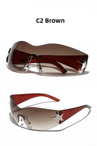 Detail view of brown gradient rimless wrap sunglasses with silver star metal accents