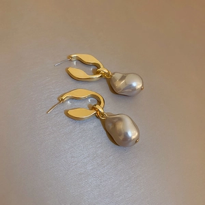 Irregular baroque pearl earrings with matte gold hooks for women in minimalist style