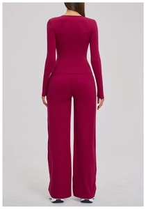 Back view of burgundy long sleeve top and wide leg pants yoga set in soft brushed fabric