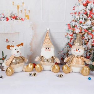 Chic silver and gold sitting Santa, snowman, and reindeer plush festive figurines set