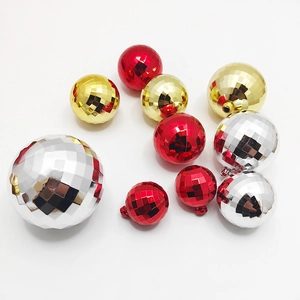 Red, gold, and silver disco mirror ball ornaments in various sizes for festive decoration