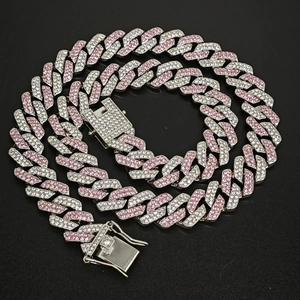 Close-up of 14mm silver and pink cuban link chain necklace with sparkling rhinestones