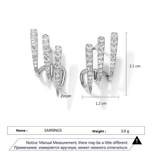 Detailed view of silver zircon three-claw earrings with dimensions of 2.1cm by 1.2cm