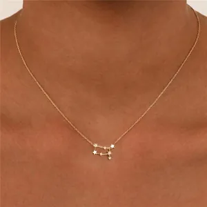 Gold 925 sterling silver zodiac necklace featuring sparkling zircon stars on a delicate chain