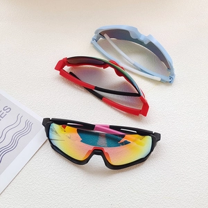 Kids cycling sports sunglasses with polarized lenses in three trendy colors for boys and girls