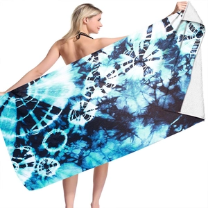 Detailed texture of blue tie-dye microfiber beach towel with 3D digital printing pattern