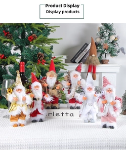 Detailed collection of 9-inch Santa Claus figurines in gold, red, silver, and white plush fabric
