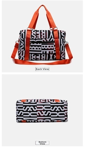 Rear and bottom views of a large travel duffel bag with bold orange straps and lettering