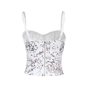 Detailed back view of a white printed camisole with a silver zipper closure