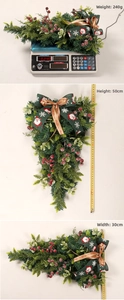 Misure e peso della decorazione natalizia a goccia da 50 cm con bacche rosse e nastri