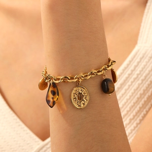 Vintage gold chunky chain bracelet with tiger eye stone and star coin charms