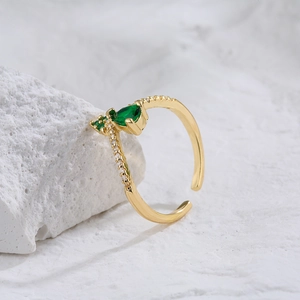 Adjustable gold plated geometric ring with pear-cut green zircon and micro-pave stones