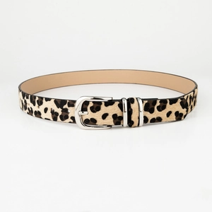 Close-up of leopard print belt showing silver metal buckle and faux pony hair texture