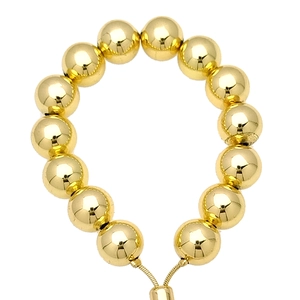 Polished 18k gold plated adjustable ball bead bracelet with minimalist metallic sphere design