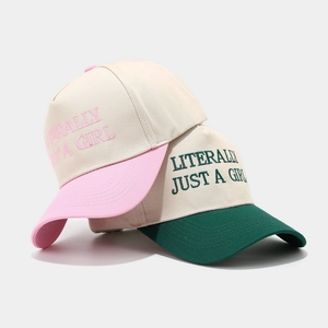 Two-tone cotton baseball caps with Literal Girl embroidery and curved contrast brims