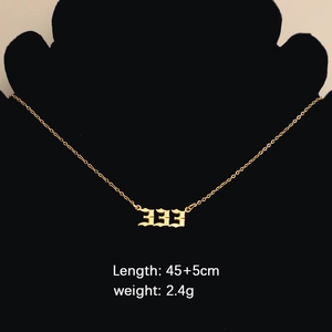 Detail showing golden number 333 necklace pendant with 45+5cm length and 2.4g weight