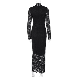 Close-up of elegant black lace embroidery and back collar detail on long sleeve dress