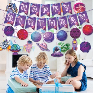 Space themed birthday party decoration set with astronaut banners and hanging swirls