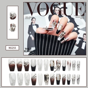 Detail of luxury press-on nails N5255 with silver rhinestones and butterfly design