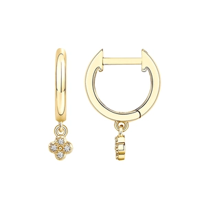Detail of gold clover hoop earrings with sparkling crystal pavé on a white background