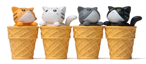 Set of four cute resin cat figurines sitting in miniature waffle cones for decor