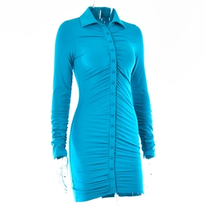 Detail view of a blue ruched mini dress with front buttons and lapel collar on a mannequin