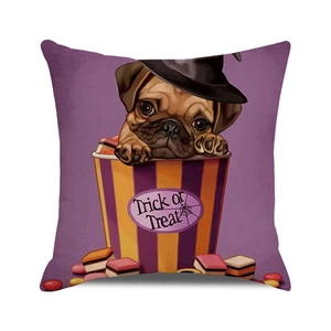 Close-up of pug in a Trick or Treat bucket printed on Halloween linen pillow cover