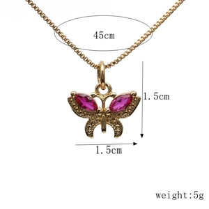 Detail view of gold butterfly necklace with zircon inlay including dimensions and weight