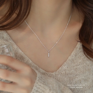 Elegant S925 sterling silver bar pendant necklace with micro-pave diamonds on model