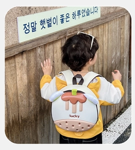 Close-up of kids cartoon mangosteen backpack with lucky embroidery and ergonomic straps