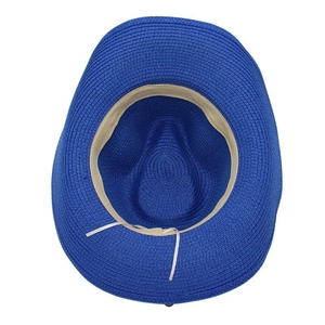 Interior view of blue woven cowboy straw hat showing sweatband and adjustable strap