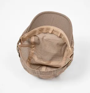 Internal view of khaki mesh newsboy cap showing breathable texture and fine stitching