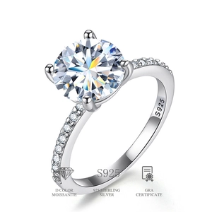 Macro detail of a classic D color moissanite ring with four-prong setting in 925 silver
