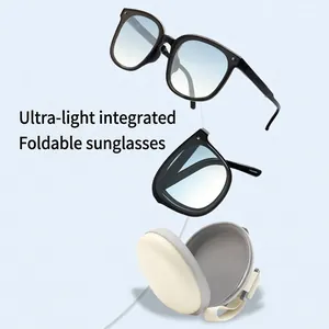 Foldable ultralight sunglasses with blue gradient lenses and compact storage case