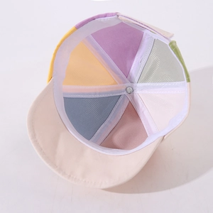 Detailed inner view of colorful patchwork baby baseball cap with soft sweatband