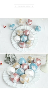 Detail of 8cm glitter leaf Christmas balls in blue gold pink white on tray