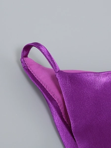 Detail of purple satin fabric texture with smooth finish and high-quality stitching