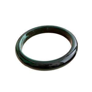 Minimalist dark green acrylic bangle with marbled vintage texture for a chic look