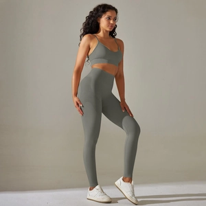 Detail of olive green seamless knitted sports bra and high-waisted yoga leggings