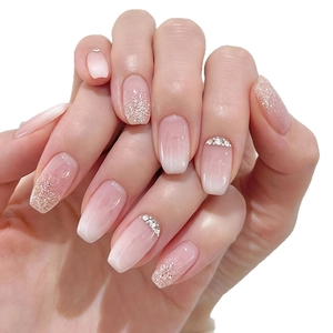 Uñas postizas de ataúd degradadas rosa y blanco con purpurina plateada y strass