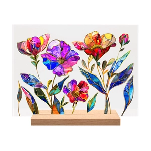 Clear acrylic table plaque with colorful floral glass effect and wooden base
