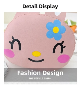 Detail shot of the cartoon rabbit shoulder bag featuring pink leather and embroidery