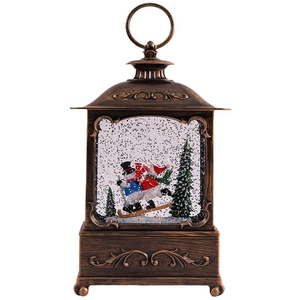 Bronze vintage Christmas lantern with snowman and pine tree scene in snow globe light