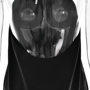 Close-up of sleek black satin backless dress with crystal straps on a mannequin