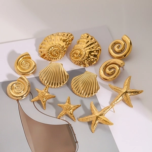 Golden stainless steel starfish and seashell stud earrings set with metallic texture