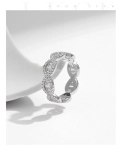 Detailed view of S925 sterling silver eternity ring with zircon infinity design and S925 stamp
