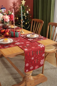 Detailed Christmas table runner and placemat set with festive red snowflake and bell patterns