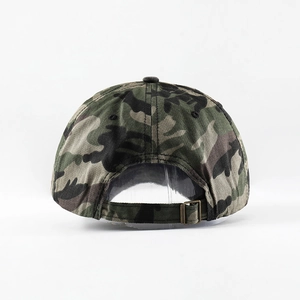 Detail of vintage camouflage baseball cap showing adjustable metal buckle and stitching