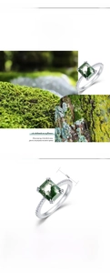 Macro shot of rectangular green moss agate ring set in S925 sterling silver band